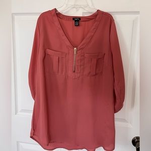Pink blouse with gold accents